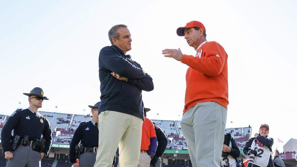 South Carolina head coach Shane Beamer meets with Clemson head coach Dabo Swinney before South Carolina’s game against Clemson at Williams-Brice Stadium in Columbia on Saturday, November 29, 2025.