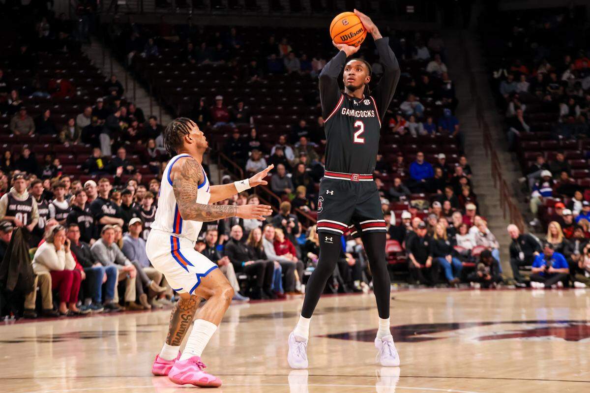 South Carolina Gamecocks guard Zachary Davis (2) attempts a three-point basket against the Florida Gators in the first half at Colonial Life Arena.