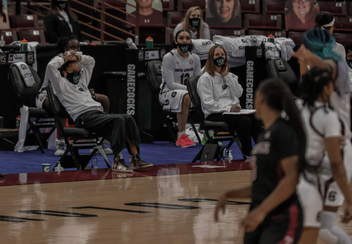 South Carolina Gamecocks head coach Dawn Staley takes on a relaxed pose during the second half of action as the Gamecocks dominate the Temple Owls at the Colonial Life Arena. The Gamecocks won, 103-41.