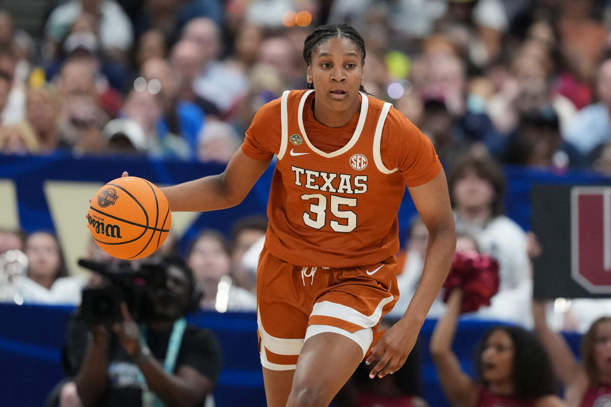 Apr 4, 2025; Tampa, FL, USA; Texas Longhorns forward Madison Booker (35) dribbles against the South Carolina Gamecocks during the third quarter in a semifinal of the women’s 2025 NCAA tournament at Amalie Arena