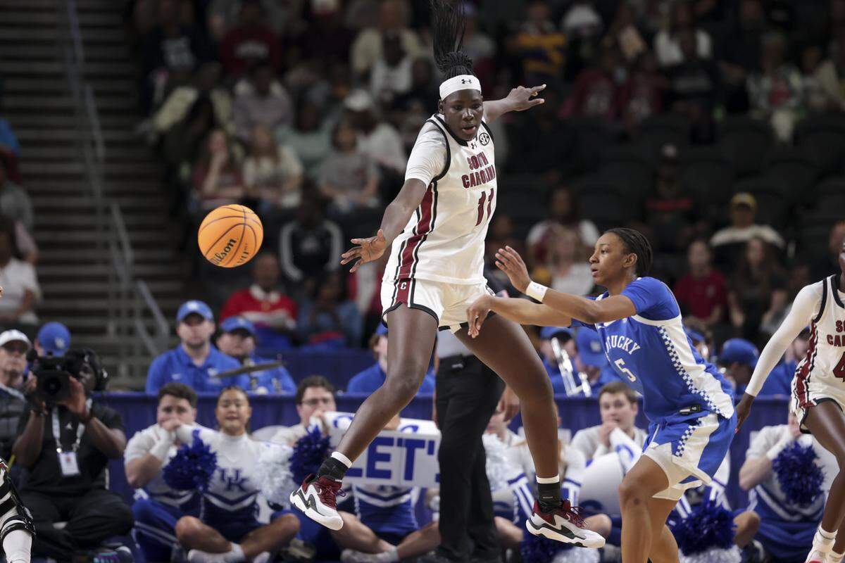 South Carolina's Madina Okot (11) pressures Kentucky’s Tonie Morgan (5) during their SEC Tournament game against Kentucky at the Bon Secours Wellness Arena on March 6. The Gamecocks beat the Wildcats 87-64.