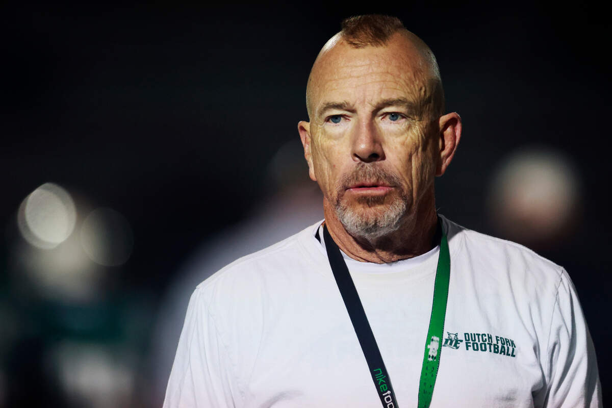 Dutch Fork head football coach Tom Knotts speaks to his team plays River Bluff at Dutch Fork on Friday, November 29, 2024.
