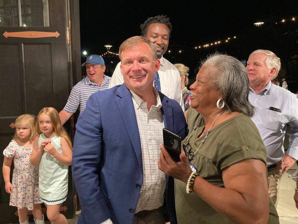 Russell Ott is congratulated after declaring victory in the senate District 26 race against incumbent Dick Harpootlian on Tuesday, June 11, 2024.