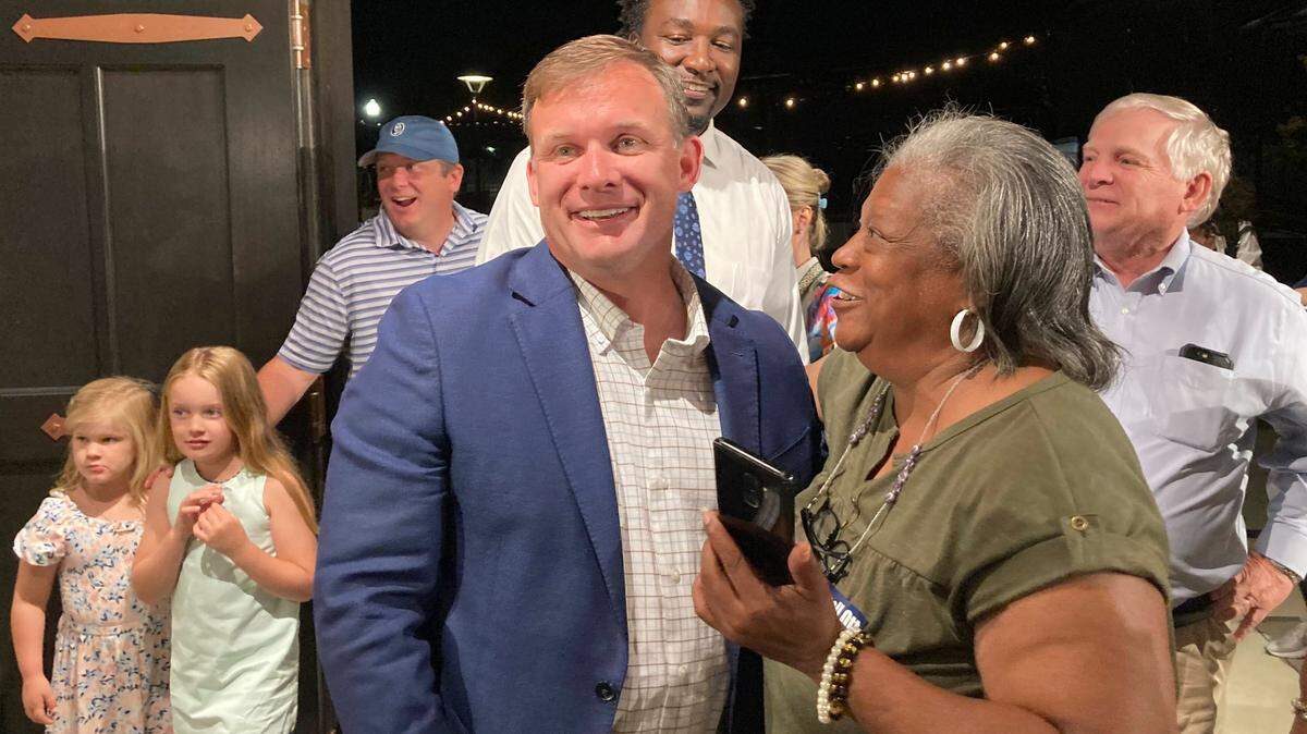 Russell Ott is congratulated after declaring victory in the senate District 26 race against incumbent Dick Harpootlian on Tuesday, June 11, 2024.