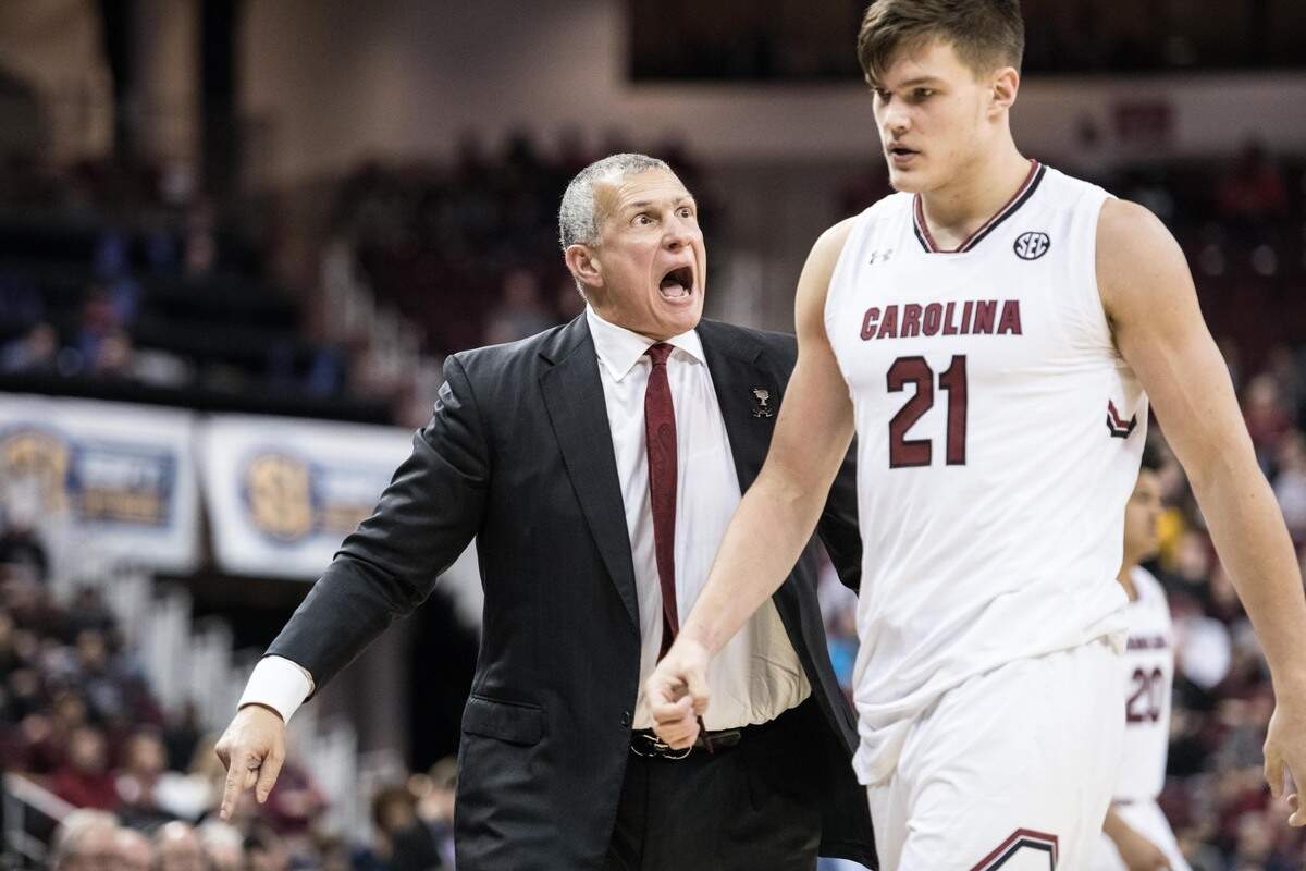 South Carolina head coach Frank Martin yells at forward Maik Kotsar (21) during a game against Mississippi at Colonial Life Arena on Feb. 19, 2019.
