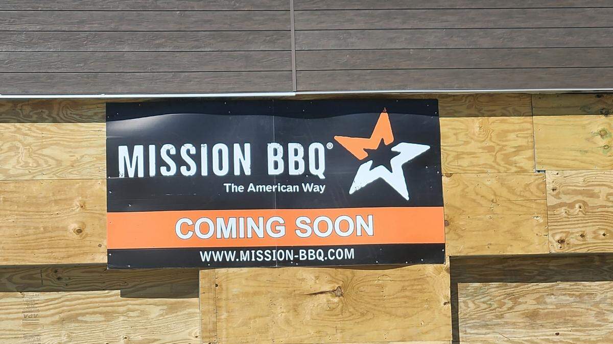 A sign indicates Mission BBQ is coming soon to 275 Harbison Boulevard in Columbia.