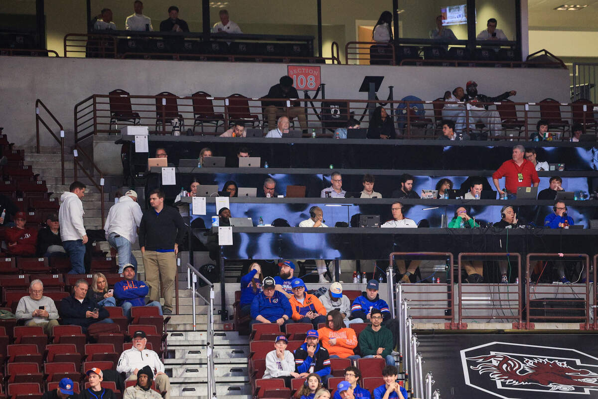 Casey Manning and Derek Scott sit with reporters in Colonial Life Arena’s media seating on Wednesday, January 28, 2026.