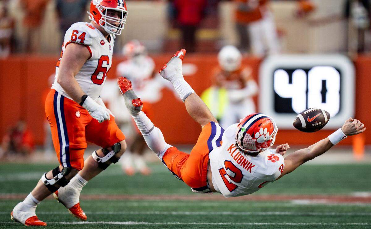 Clemson Tigers quarterback Cade Klubnik (2) looses his grip on the ball before he can complete at pass in the third quarter as the Texas Longhorns play the Clemson Tigers in the first round of the College Football Playoffs at Darrell K Royal Texas Memorial Stadium in Austin, Texas, Dec. 21, 2024.