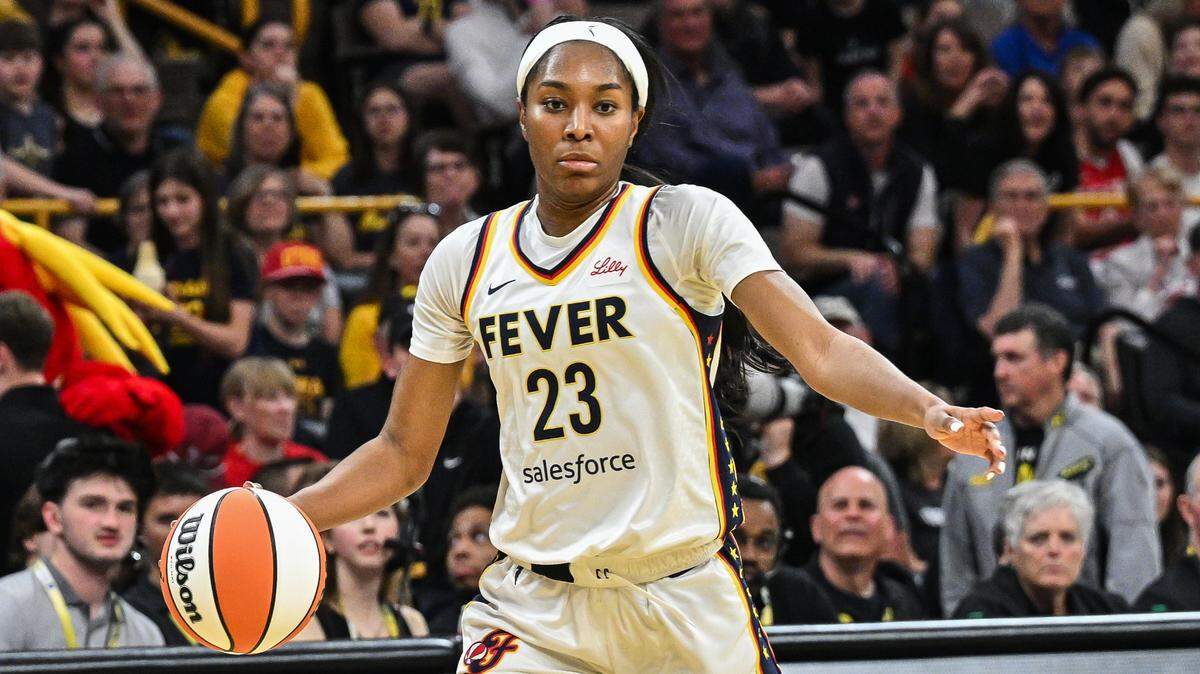 Bree Hall (23) controls the ball against the Brazil National Team during the fourth quarter at Carver-Hawkeye Arena.