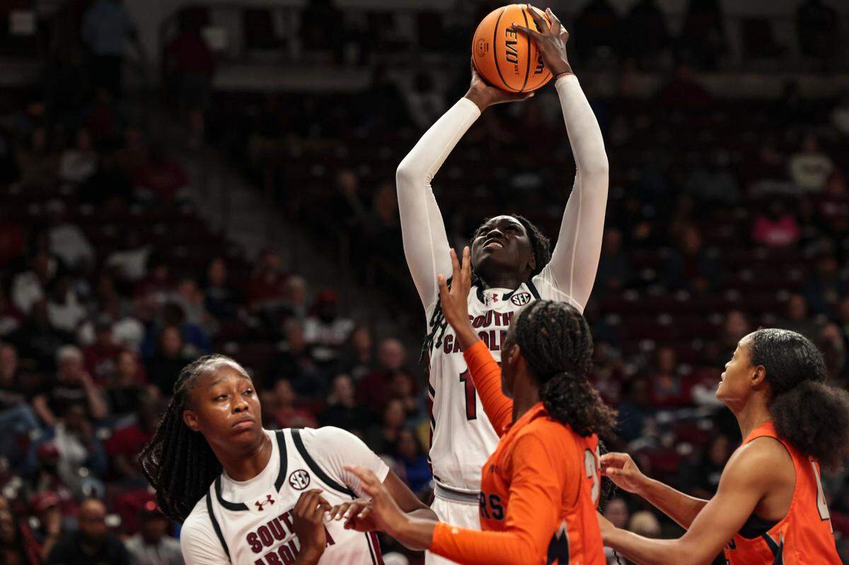 University of South Carolina forward Adhel Tac (15) pulls down a rebound during the second half of action in the Colonial Life Arena on Monday, Oct. 28, 2024.