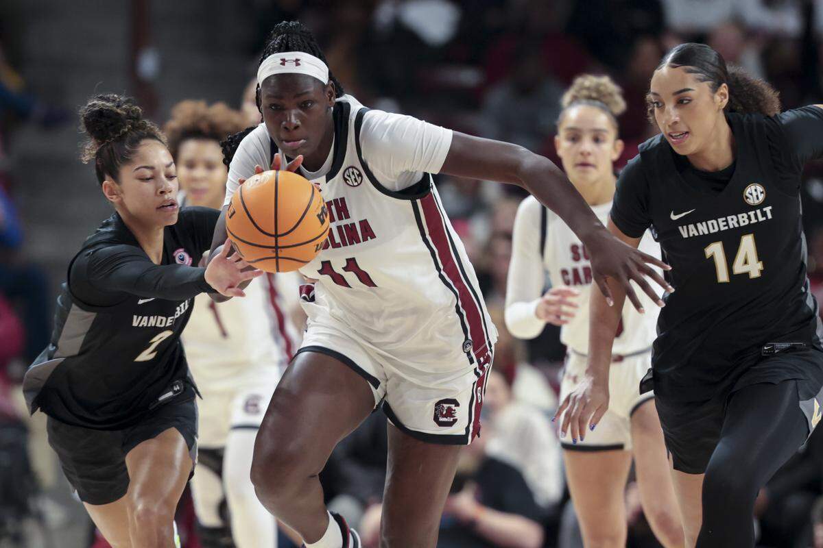 South Carolina's Madina Okot (11) drives downcourt after swiping the ball from Vanderbilt's Jada Brown (2) against Vanderbilt at Colonial Life Arena on Jan. 25.