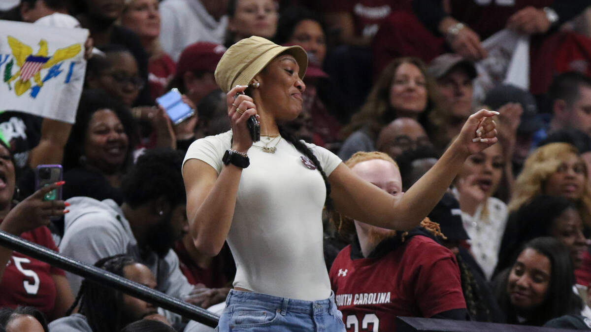 A’ja Wilson dances in the stands while watching the national championship game against UConn at the Target Center in Minneapolis, Minn. on Sunday April 3, 2022.