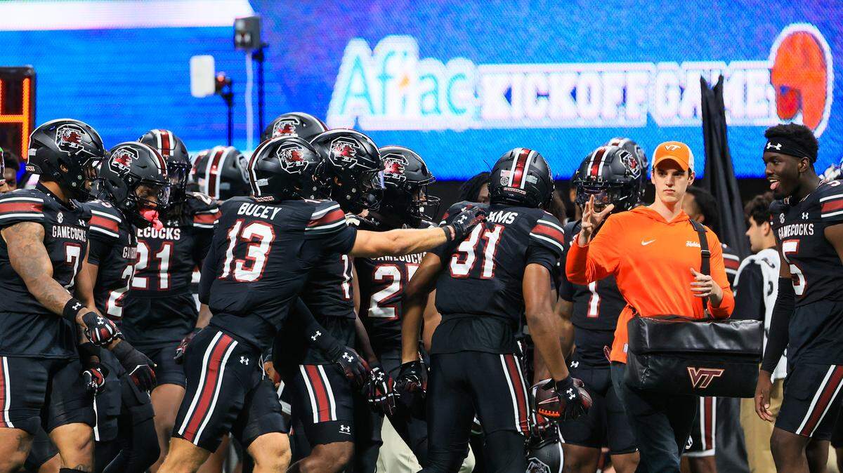 South Carolina celebrates their teammate South Carolina defensive back Peyton Williams (31) gaining yards against Virginia Tech in the 2025 Aflac Kickoff Game at the Mercedes-Benz Stadium in Atlanta, Georgia on Sunday, August 31, 2025.