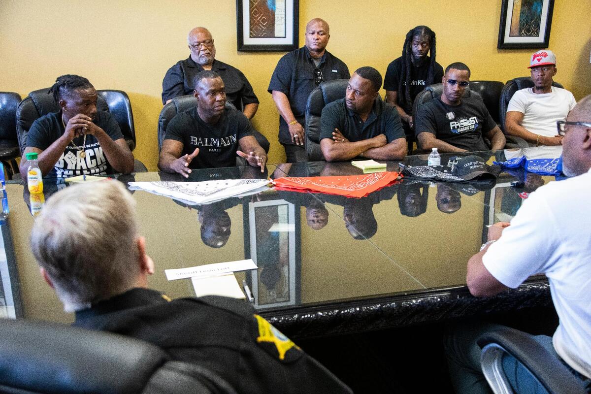 Former gang members, religious leaders and community organizers talk with local law enforcement on their plans to reduce gun violence in Columbia, South Carolina on Saturday, June 4, 2022. Plans this group want help from across the city in accomplishing include more summer time activities for young people, assistance helping former gang members find work in the formal economy and assurance that police would not interfere with organizers trying to stop violence.