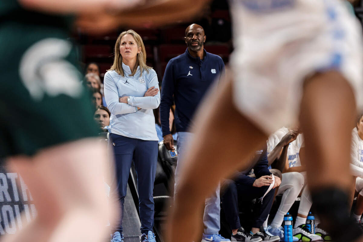 University of North Carolina head coach Courtney Banghart and assistant coach Adrian Walters watch their team play Michigan State during the first half of action in the first round of the NCAA Tournament at the Colonial Life Arena in Columbia, SC, on Friday, Mar. 22, 2024
