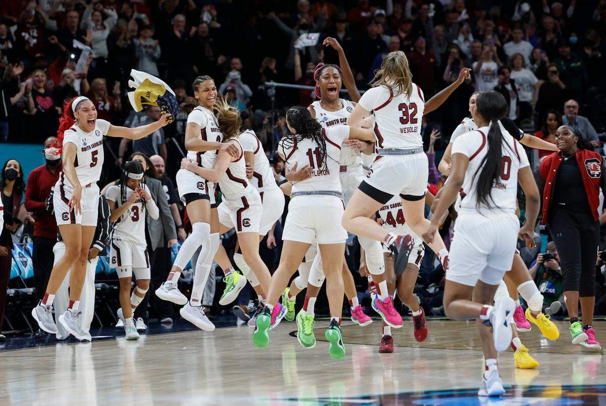 The South Carolina Gamecocks celebrate winning the national championship game against UConn at the Target Center in Minneapolis on Sunday.