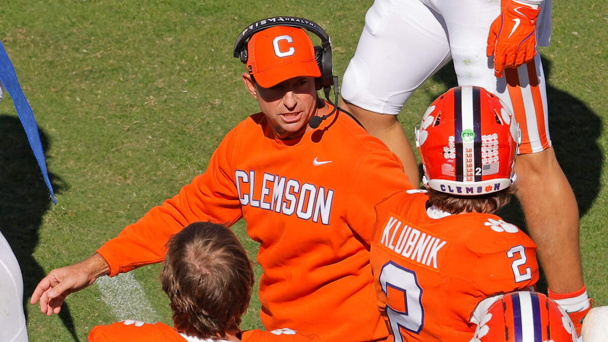 Clemson head coach Dabo Swinney talks with Clemson quarterback Cade Klubnik (2) against Duke during first-half action in Clemson, S.C. on Saturday, Nov. 1, 2025.