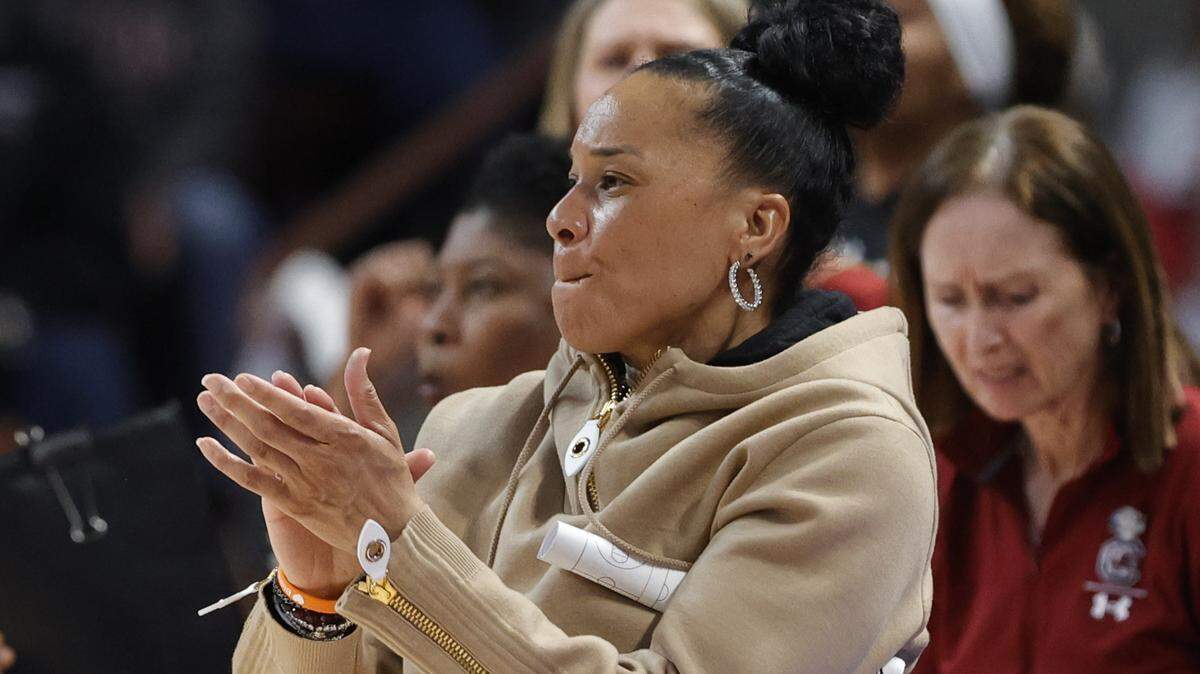 University of South Carolina Head Coach Dawn Staley applauds her team during the second half of action against the University of North Carolina in the second round of the NCAA Tournament at the Colonial Life Arena in Columbia, SC, on Sunday, March. 24, 2024.