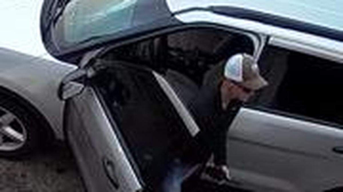 Surveillance photo of the man who is impersonating a police or Secret Service officer, according to Greenville County Sheriff’s Office.