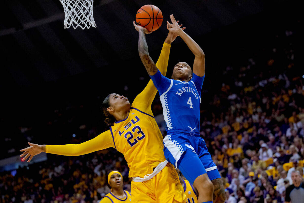 Mar 3, 2024; Baton Rouge, Louisiana, USA; Kentucky Wildcats guard Eniya Russell (4) shoot against LSU Lady Tigers center Aalyah Del Rosario (23) during the first half at Pete Maravich Assembly Center.