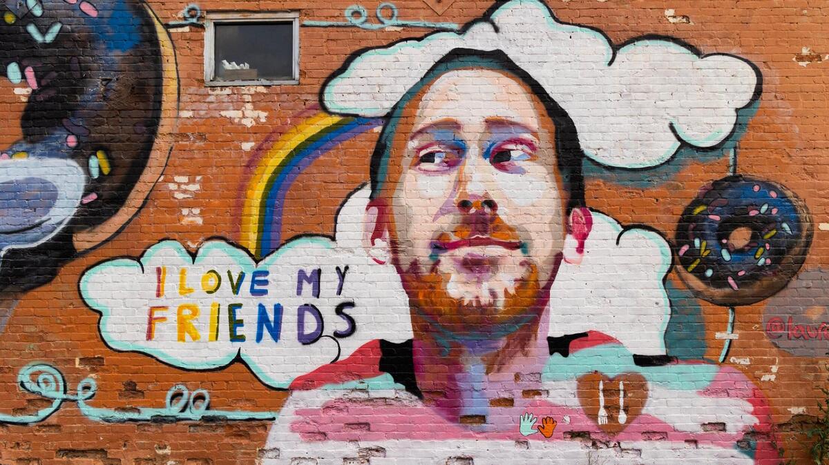 A mural of Aaron Graves, the lead singer of Columbia band Those Lavender Whales, on the side of the Hunter-Gatherer Alehouse on Main Street in Columbia, South Carolina. Graves died in 2019 of a brain tumor.