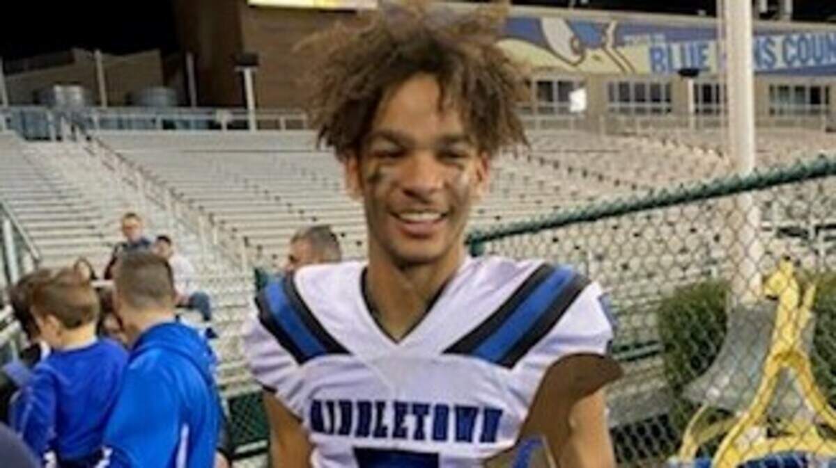 Middletown quarterback and South Carolina commit Braden Davis holds state championship trophy after the Cavaliers defeated Smyrna for Delaware Class 3A title on Dec. 11, 2021.