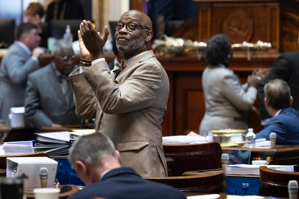 South Carolina State Representative Robert Reese, D-Richland, greets visitors before house members debate amendments to the state budget on Tuesday, March 11, 2025.