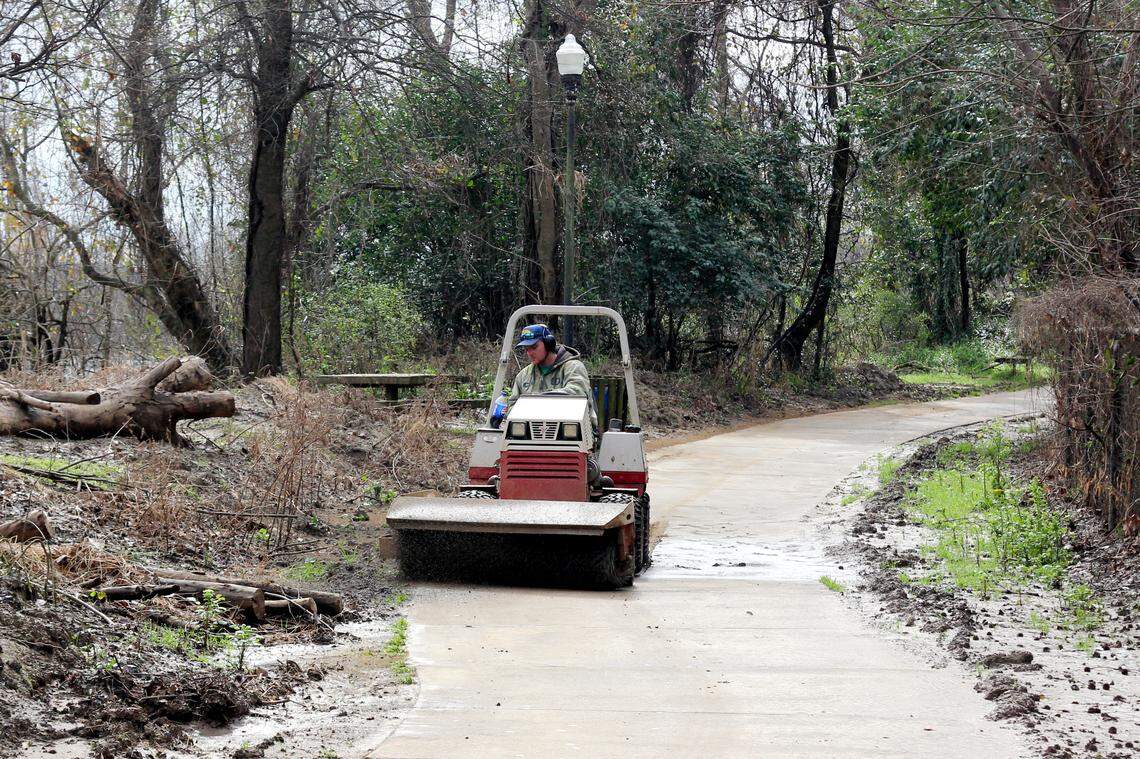 Work to clean up the Cayce Riverwalk continued March 7.