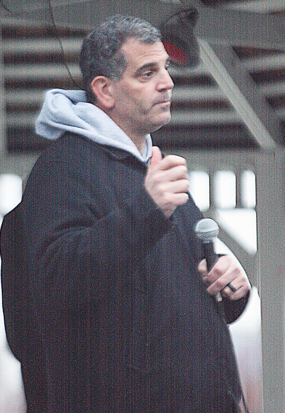 Seymour Josephson speaks Tuesday night in Robbinsville, New Jersey, at a vigial to remember his daughter, Samantha Josephson.