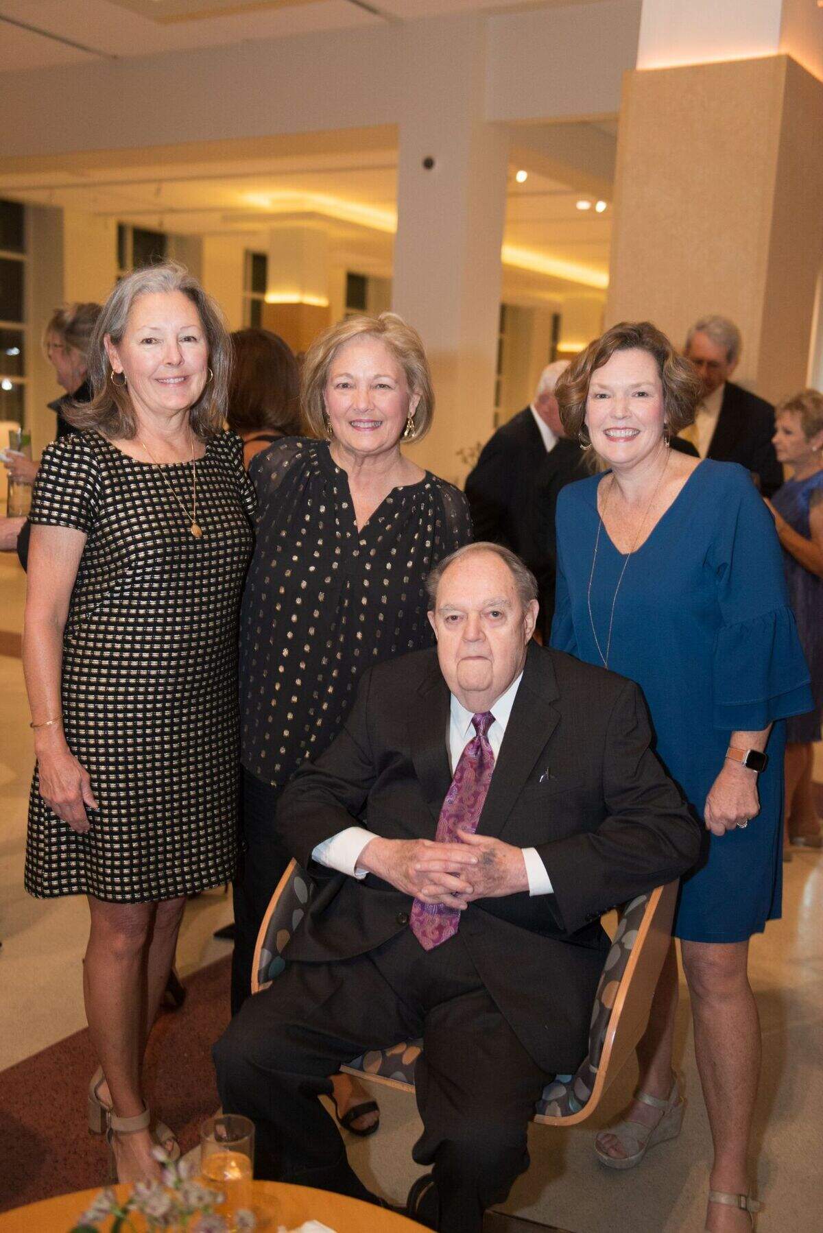 Sam McCuen with his three daughters, Kathryn Huntley, Debbie Elmore and Sandra Holland, at a banquet when he received an honor from the Columbia Museum of Art.