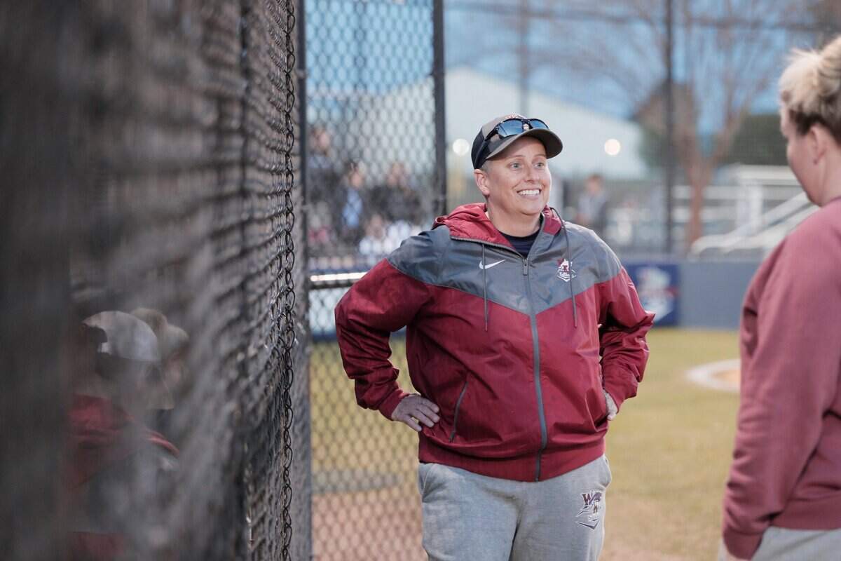 White Knoll coach April Farr speaks to her team before their game against Chapin on Tuesday, March 29, 2022 at White Knoll High School.