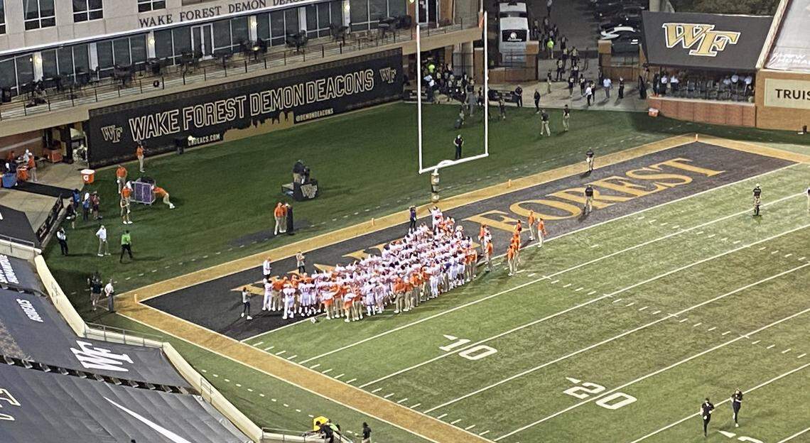 Check out this surreal scene: With no Clemson fans or band in attendance to celebrate the victory with, the Tigers used a speaker to play the alma mater in the end zone at Truist Field before leaving the stadium and heading home.