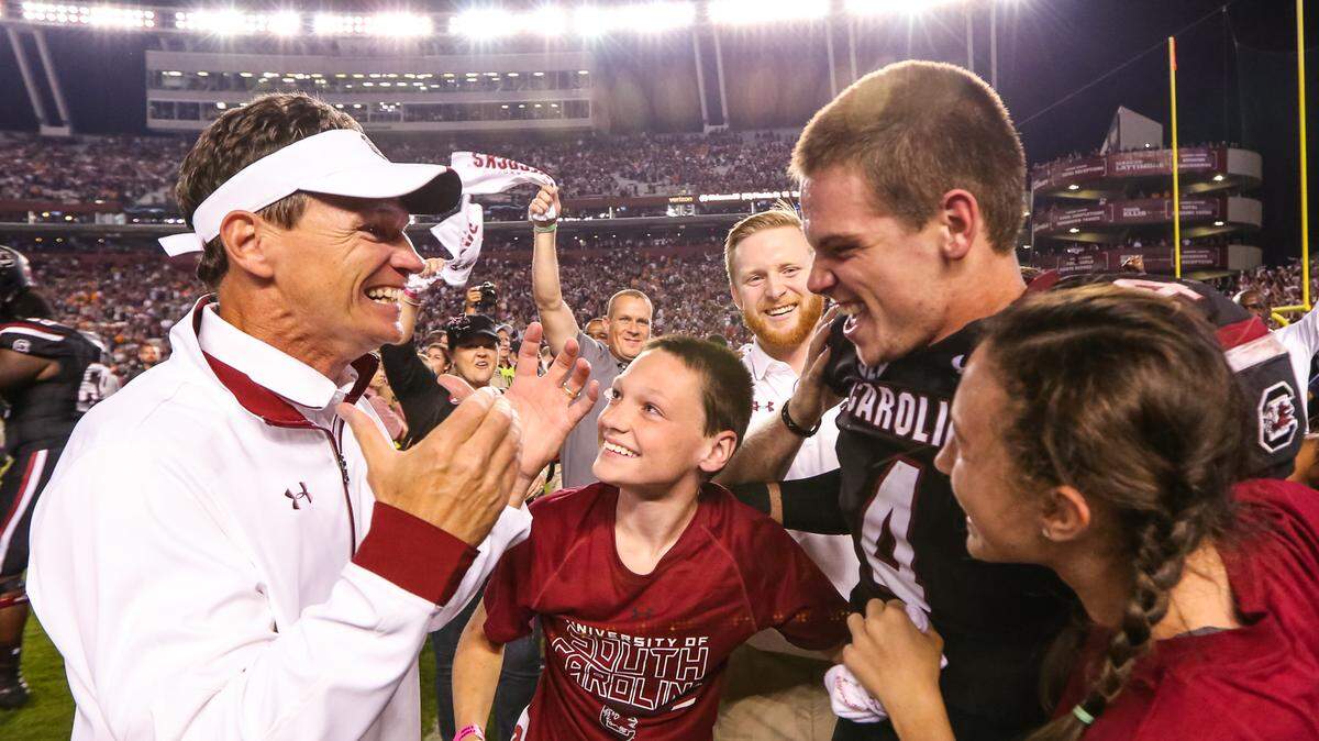 From 2016: Then-USC running backs coach Bobby Bentley celebrates the 24-21 win over Tennessee with son South Carolina quarterback Jake Bentley (4) at Williams-Brice Stadium in Columbia, SC, Saturday, October 29, 2016.