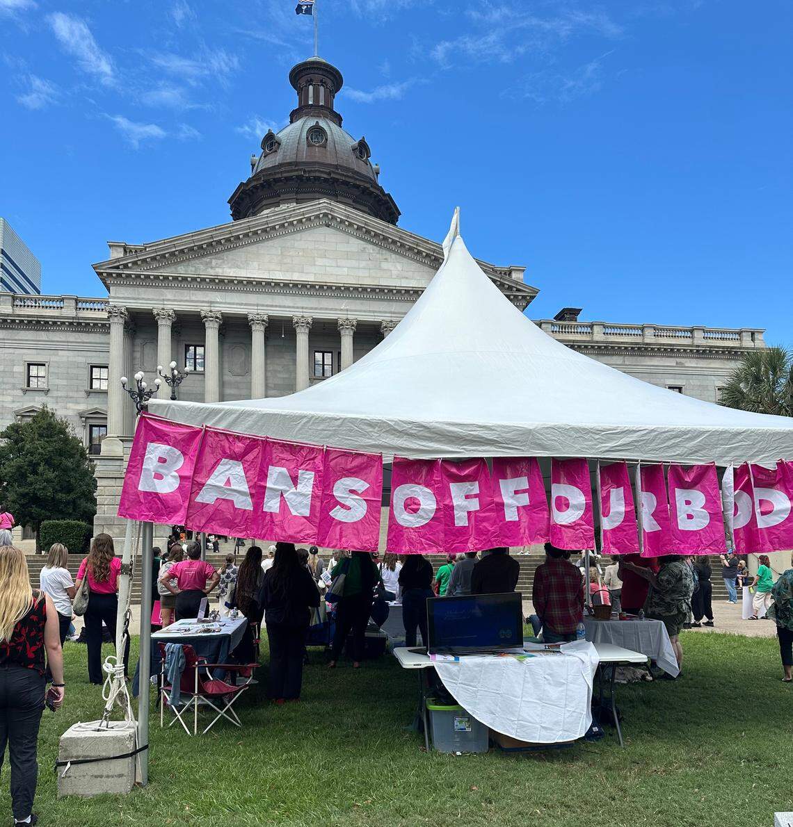 Planned Parenthood hosts a rally on the South Carolina statehouse lawn Wednesday, Oct. 1, 2025 in Columbia. A TV was set up outside to watch testimonies on a proposed near total abortion ban.