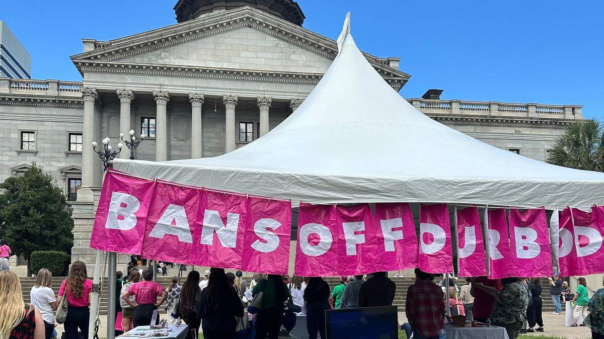 Planned Parenthood hosts a rally on the South Carolina statehouse lawn Wednesday, Oct. 1, 2025 in Columbia. A TV was set up outside to watch testimonies on a proposed near total abortion ban.