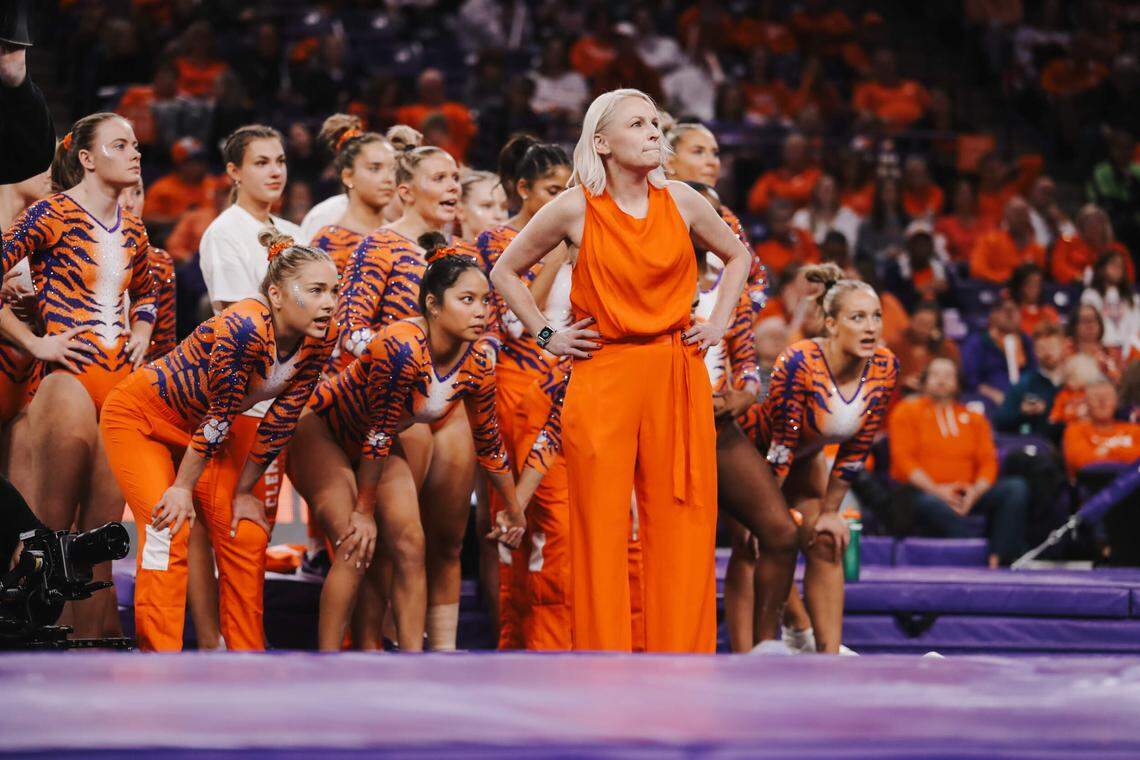 Clemson announced it was firing gymnastics coach Amy Smith (middle) two weeks after the team’s 2025 season ended