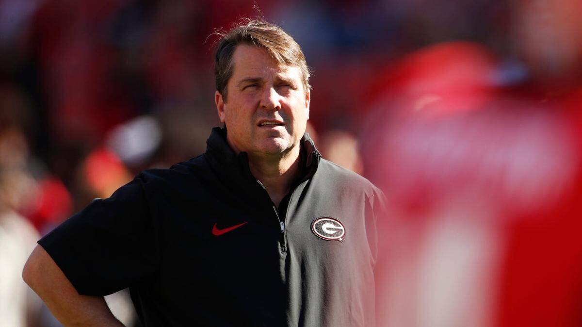 Will Muschamp looks on during warm ups before the start of a NCAA college football game against Missouri in Athens, Ga., on Saturday, Nov. 4, 2023.