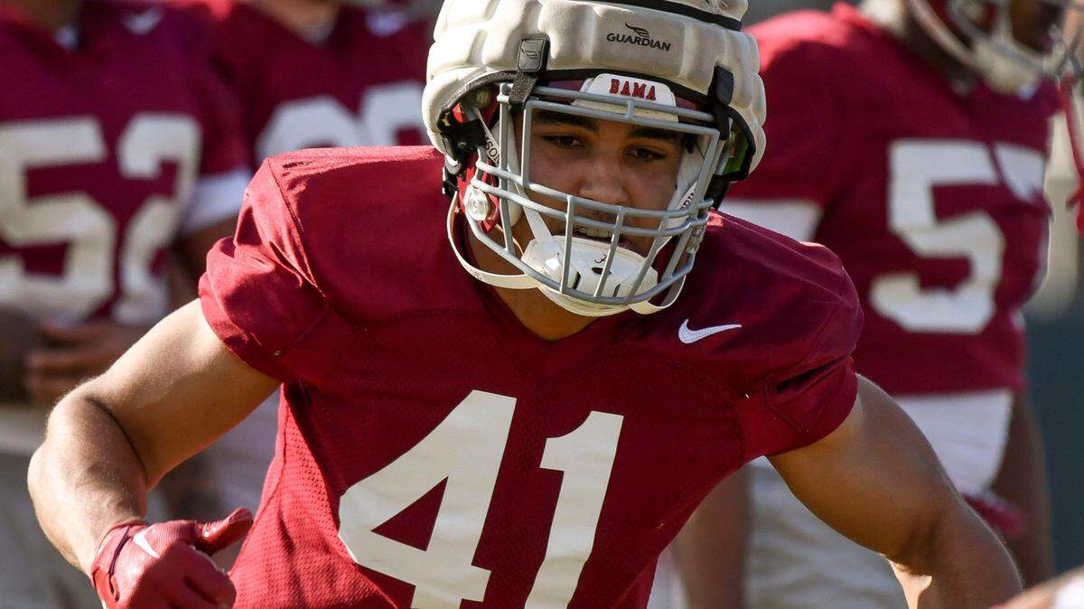 Linebacker Justin Okoronkwo does a drill during practice for the Alabama Crimson Tide football team Wednesday.