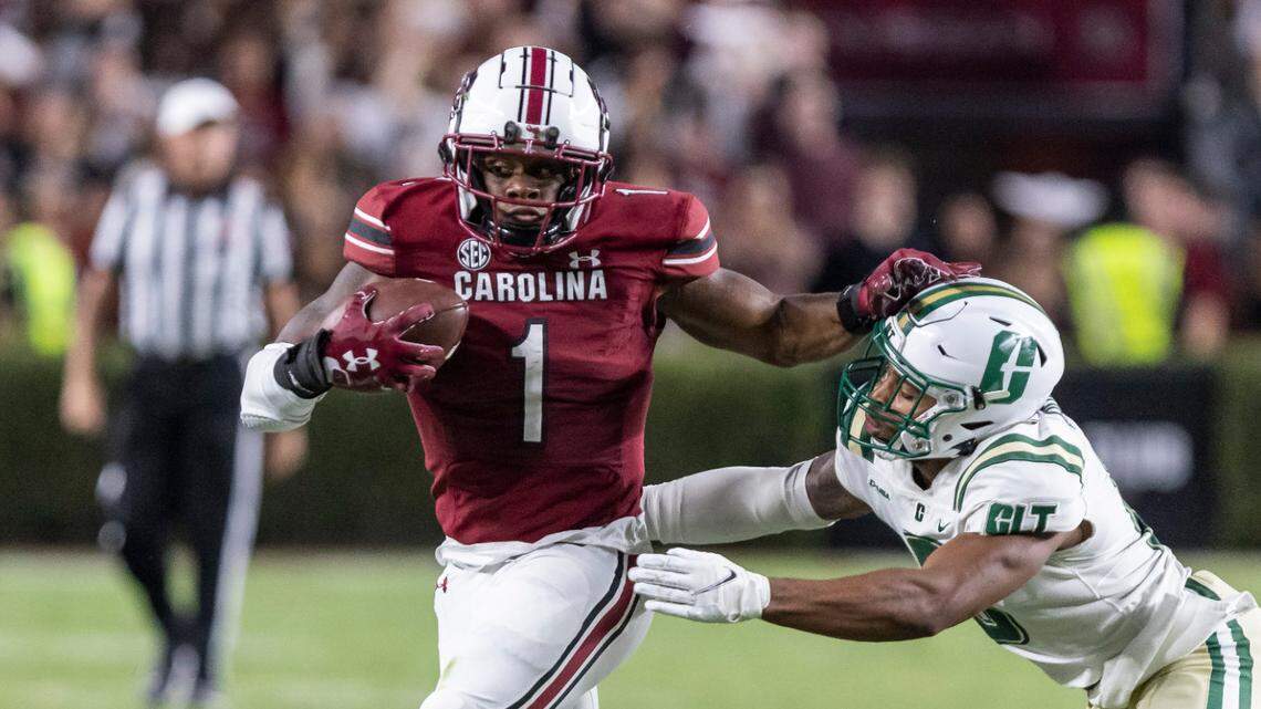 South Carolina running back MarShawn Lloyd (1) pushes off Solomon Rogers (6) of the University of North Carolina at Charlotte at Williams-Brice Stadium in Columbia, SC on Saturday, Sept. 24, 2022.
