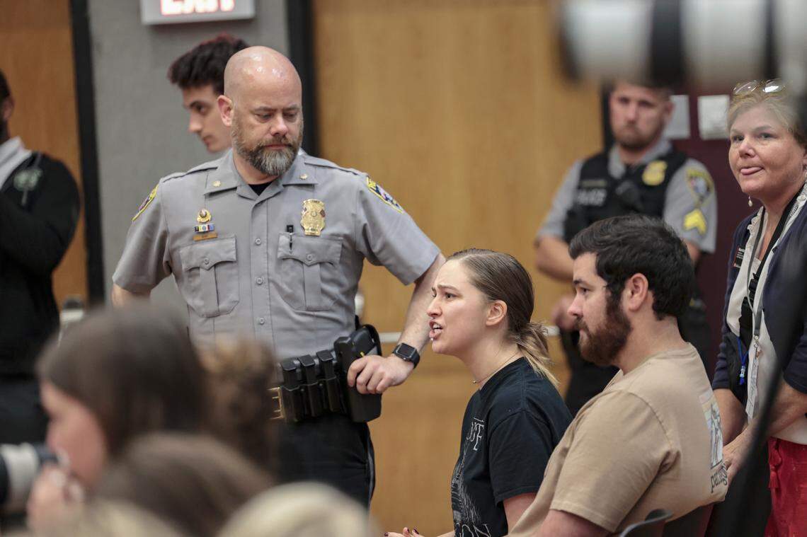 Graduate student Olivia Summers pushes Milo Yiannopoulos and Gavin McInnes for an answer to her question about immigration during a ‘roast’ of Kamala Harris at the University of South Carolina Russel House on Wednesday, Sept. 18, 2024. The event was hosted by USC’s chapter of Uncensored America.