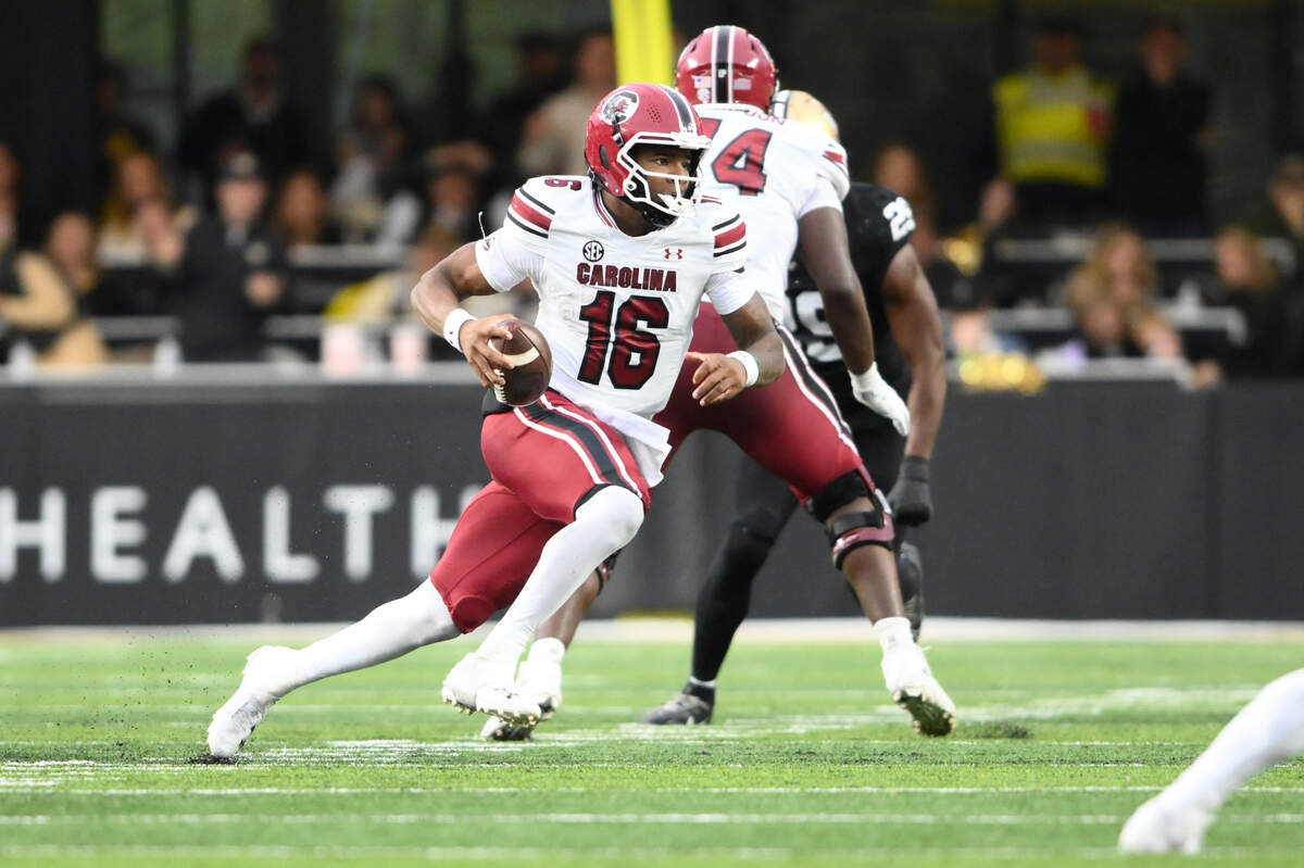 South Carolina Gamecocks quarterback LaNorris Sellers (16) runs the ball against the Vanderbilt Commodores during the game at FirstBank Stadium.