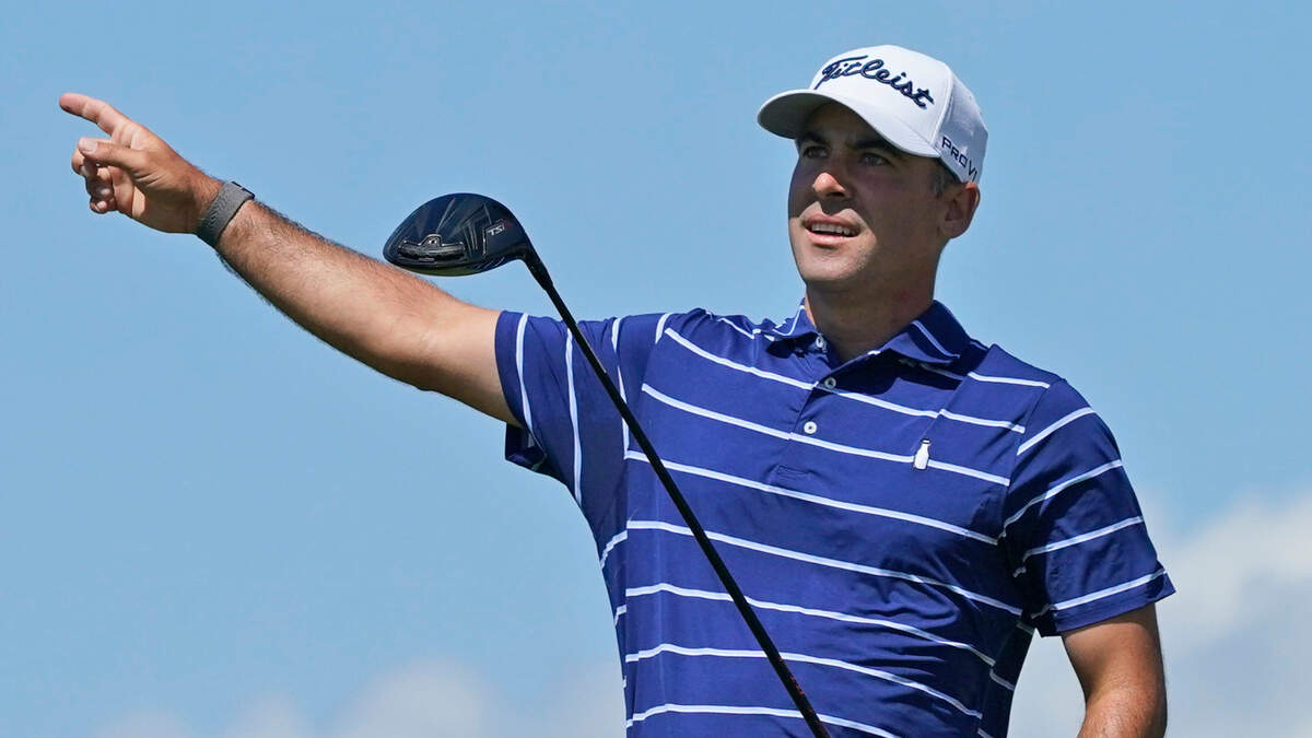 Patrick Rada points out the direction of his tee shot on the 15th hole during the first round of the PGA Championship golf tournament on the Ocean Course Thursday, May 20, 2021, in Kiawah Island, S.C.