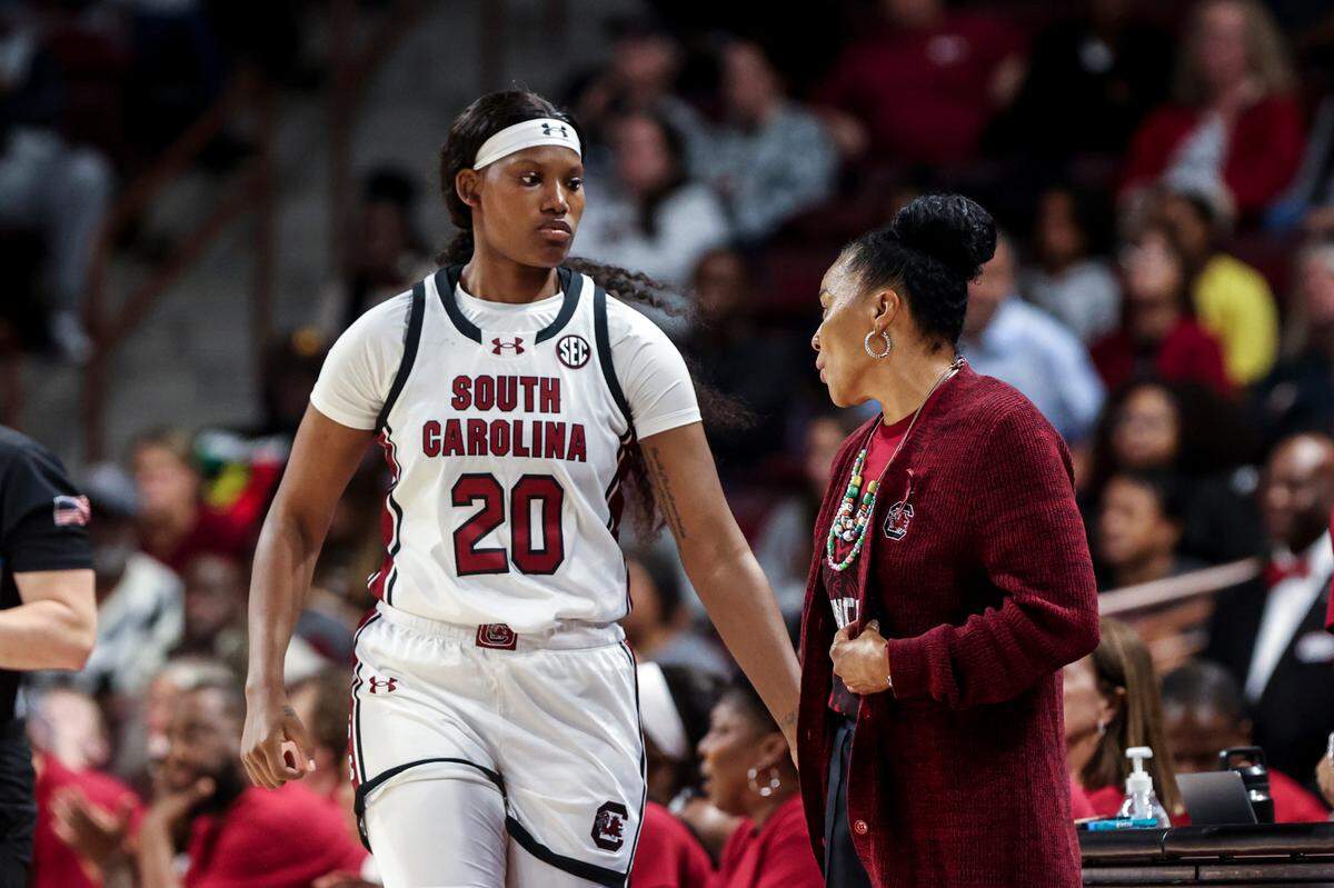 University of South Carolina Head Coach Dawn Staley puts University of South Carolina forward Sania Feagin (20) in the game during the first half of action against Clayton State in the Colonial Life Arena on Monday, Oct. 28, 2024.