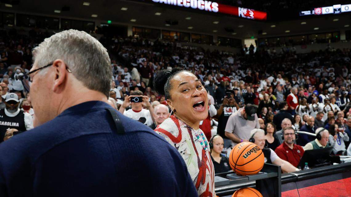 University of South Carolina Head Coach Dawn Staley greets UConn head coach Geno Auriemma before the teams play in the Colonial Life Arena on Sunday, Feb. 11, 2024