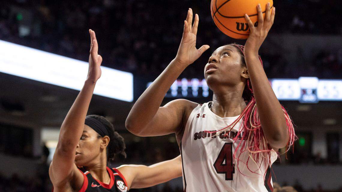 South Carolina Gamecocks forward Aliyah Boston (4) puts up a shot as Georgia Bulldogs forward Malury Bates (22) defends during South Carolina’s game against the visiting Bulldogs at Colonial Life Arena in Columbia on Sunday, February 26, 2023.