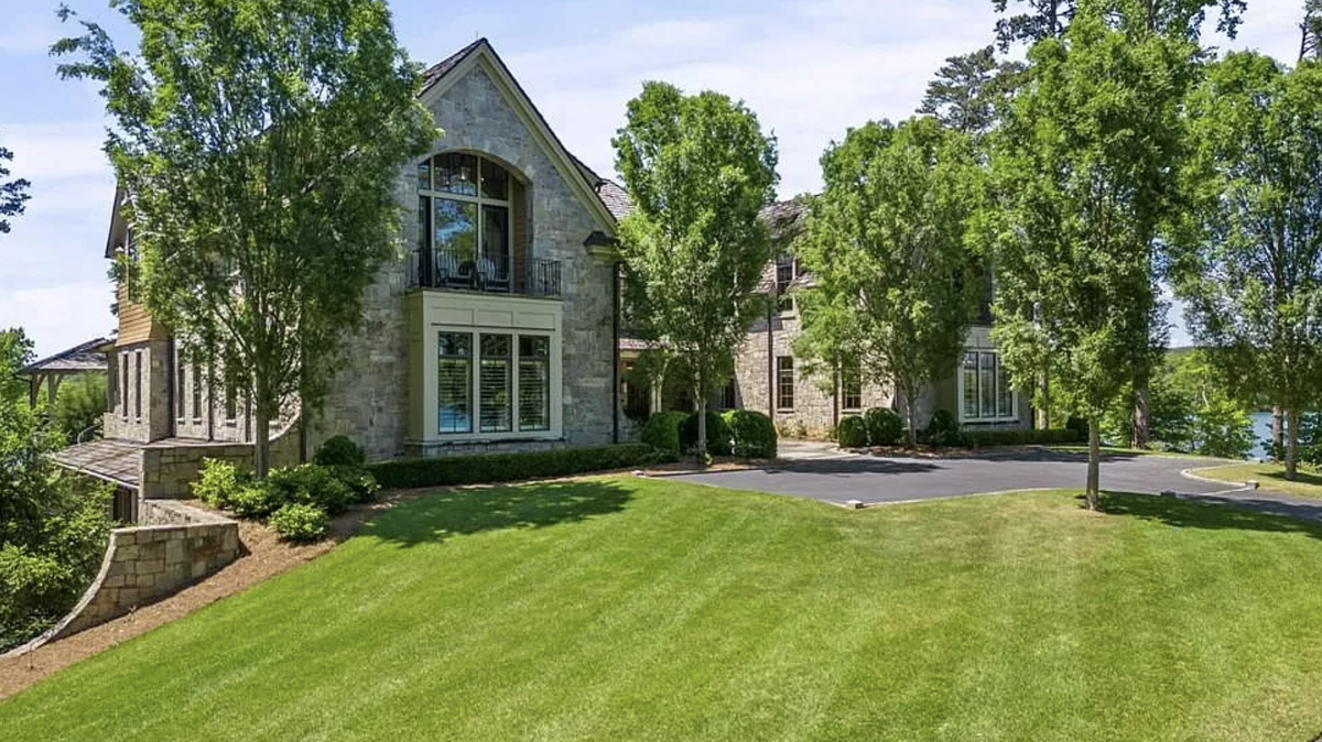 The house is located at 132 Mountain Shore Trail in Six Mile in the Cliffs at Keowee Springs community.