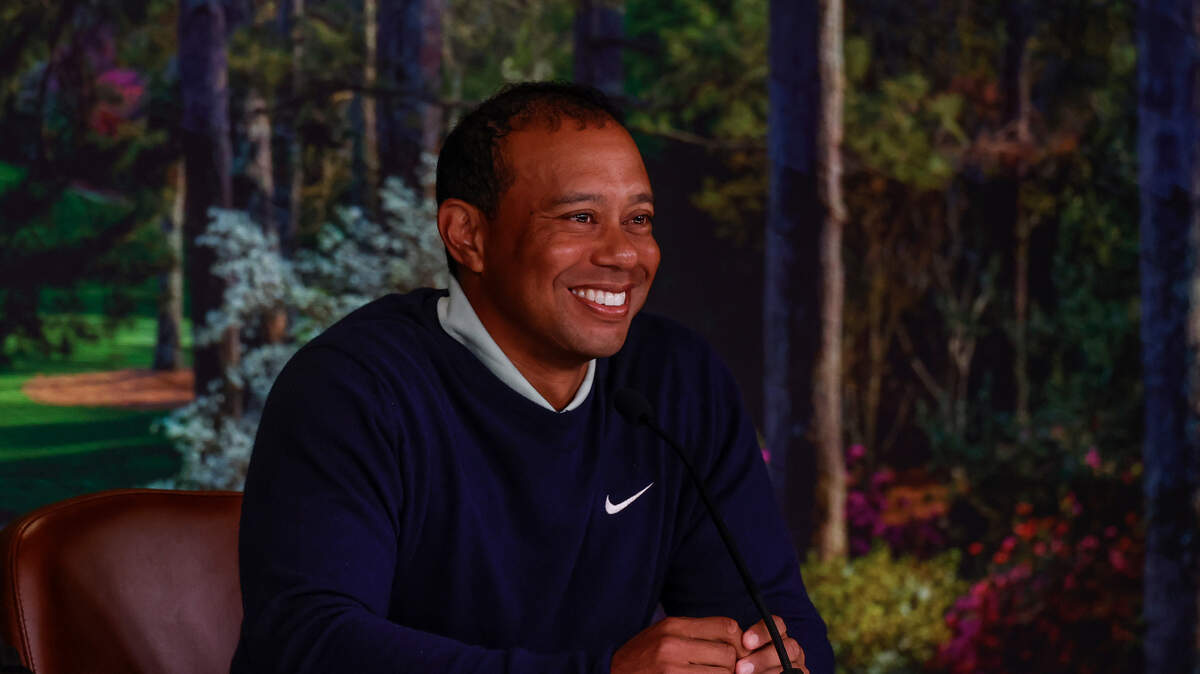 Masters champion Tiger Woods speaks to the media in a press conference in the Interview Room during practice round 2 for the Masters at Augusta National Golf Club, Tuesday, April 5, 2022.