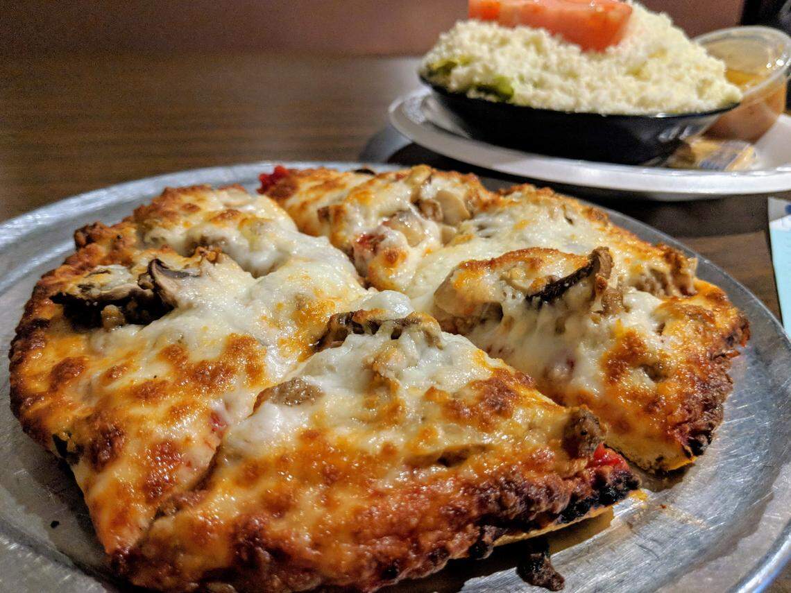 The pizza and cheese salad at LaBrasca’s