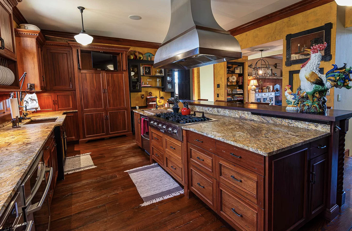 The kitchen has top-of-the-line appliances and a large pantry.