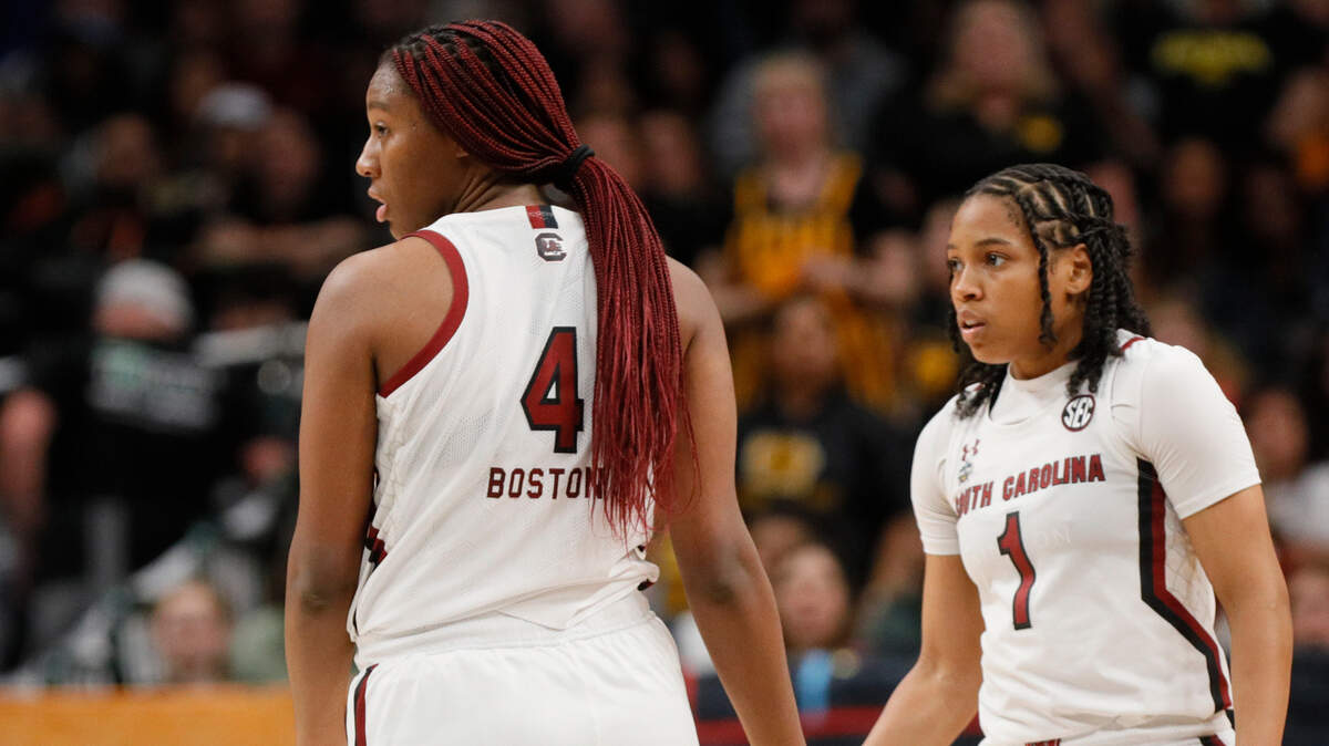 South Carolina Gamecocks forward Aliyah Boston (4) and guard Zia Cooke (1) low-five one another during the game against Iowa in the NCAA Tournament Final Four game at the American Airlines Center on Friday.